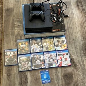 PlayStation 4 Bundle 500GB, 2 controllers, 9 games & $25 GC